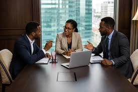 Colleagues discussing growth charts during a digital strategy meeting